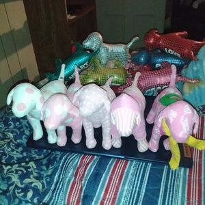 WHITE WITH PINK POLKA DOTS SOLD SO ITS ONLY 15 DOGS FOR 50